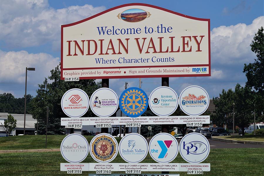 Harleysville, PA Insurance - Sign for Indian Valley in Pennsylvania, Ball Fields and a Bright Blue Sky Behind
